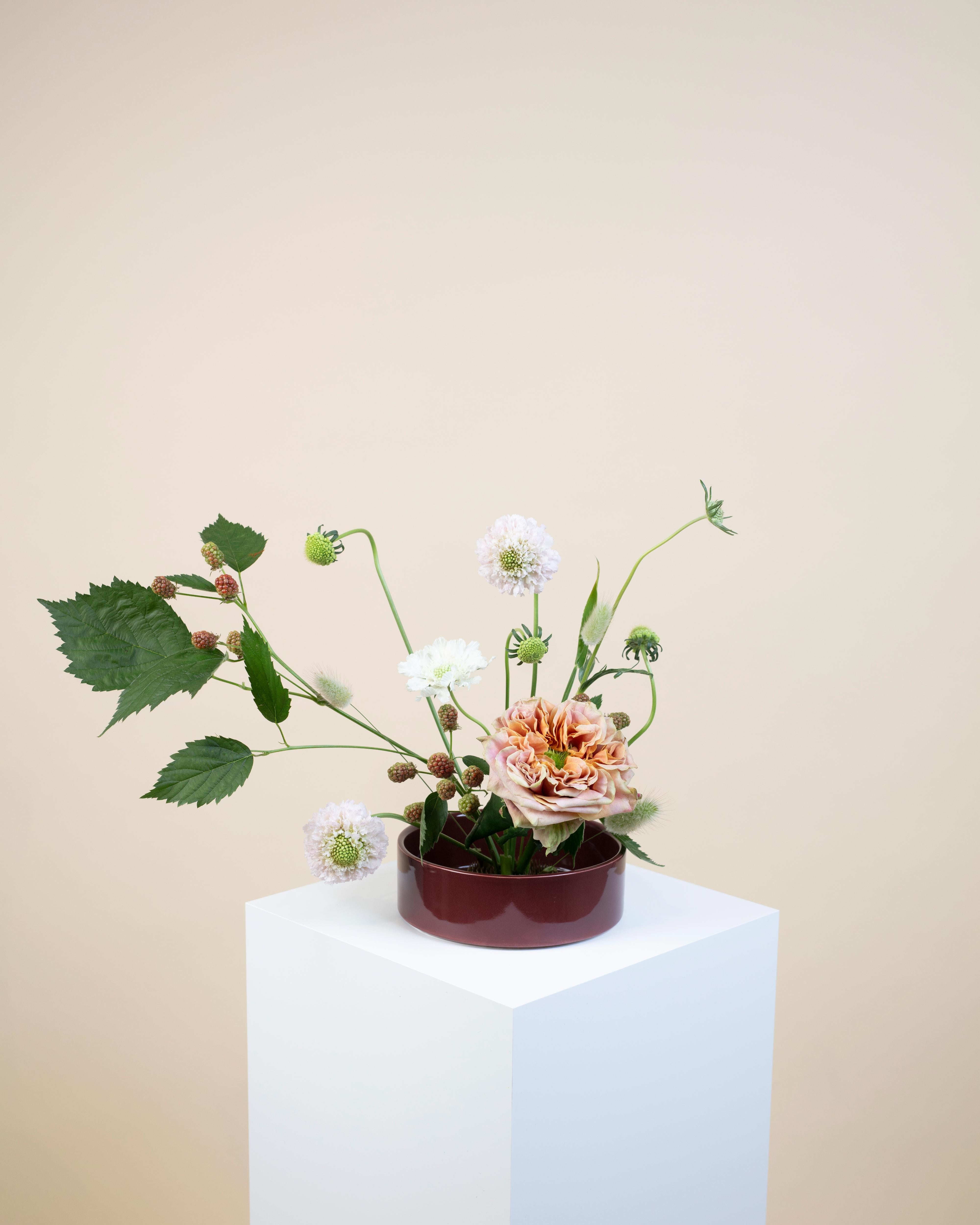 Ikebana Flowers with Burgundy Vase